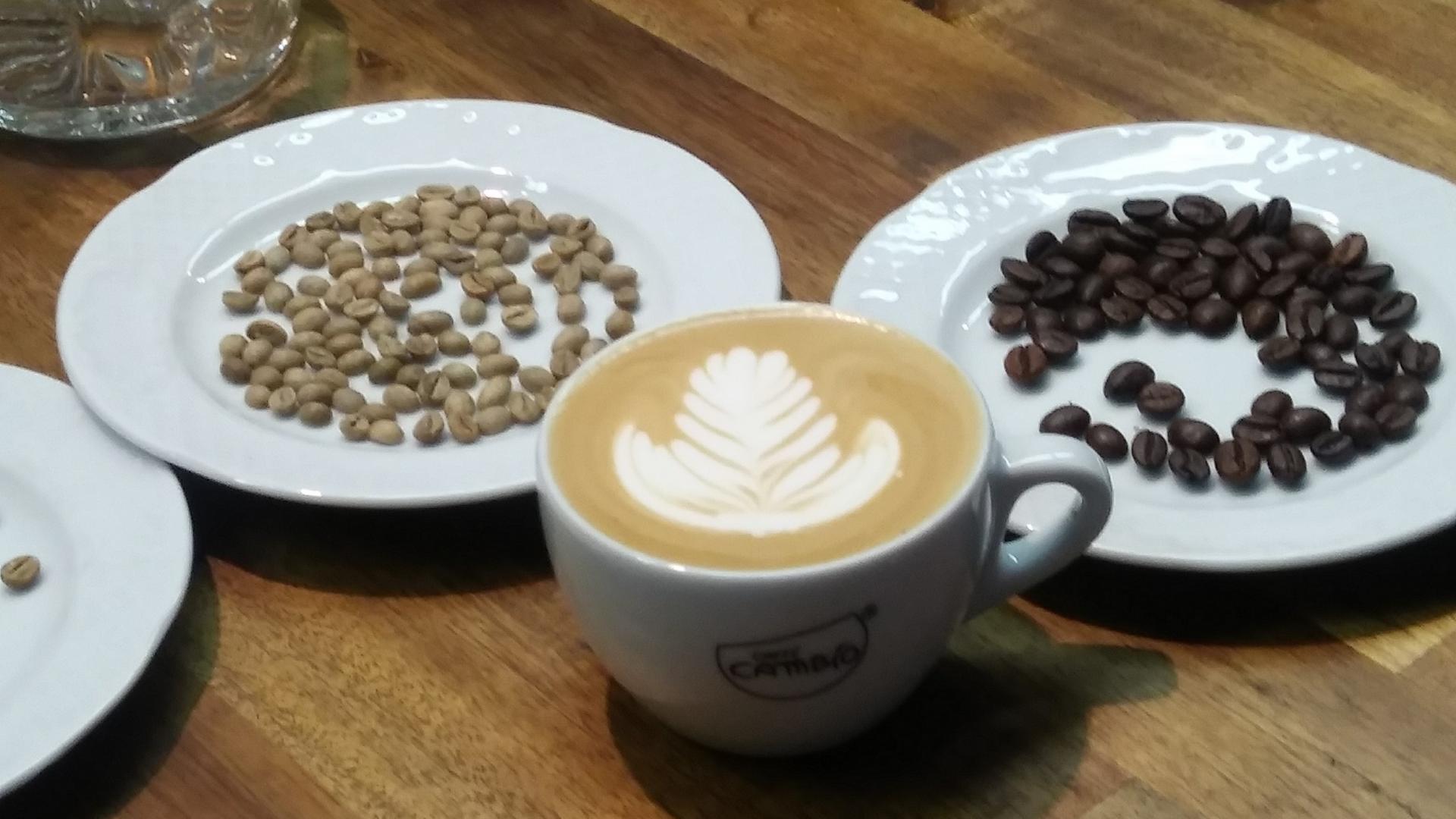 cappuccino and coffee beans